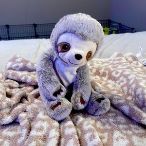 A Douglas Baby sloth stuffed animal